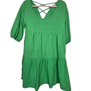 Umgee green, tiered mini dress, sometimes referred to as a Henley Peasant Dress